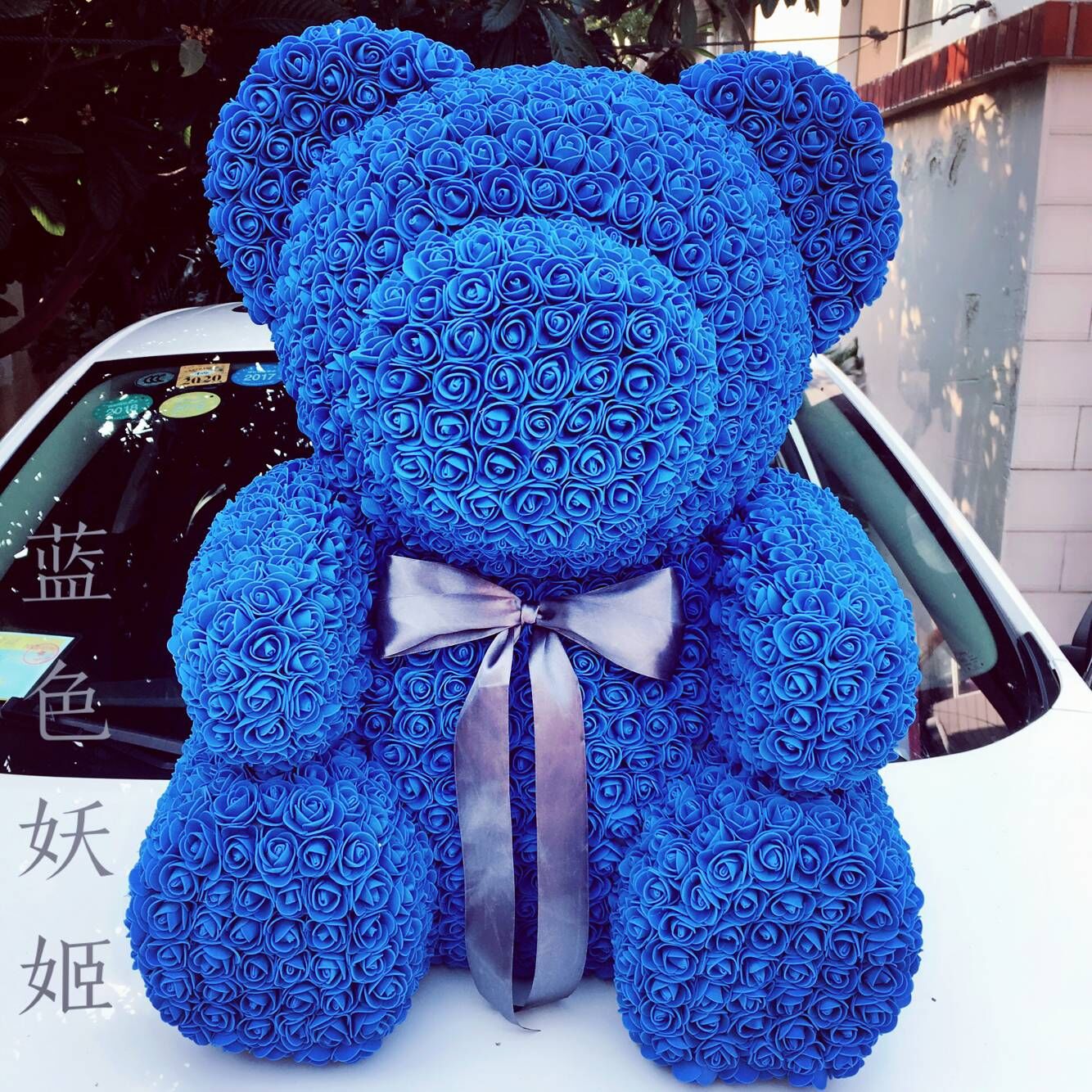 Rose Teddy Bear with Artificial Flowers
