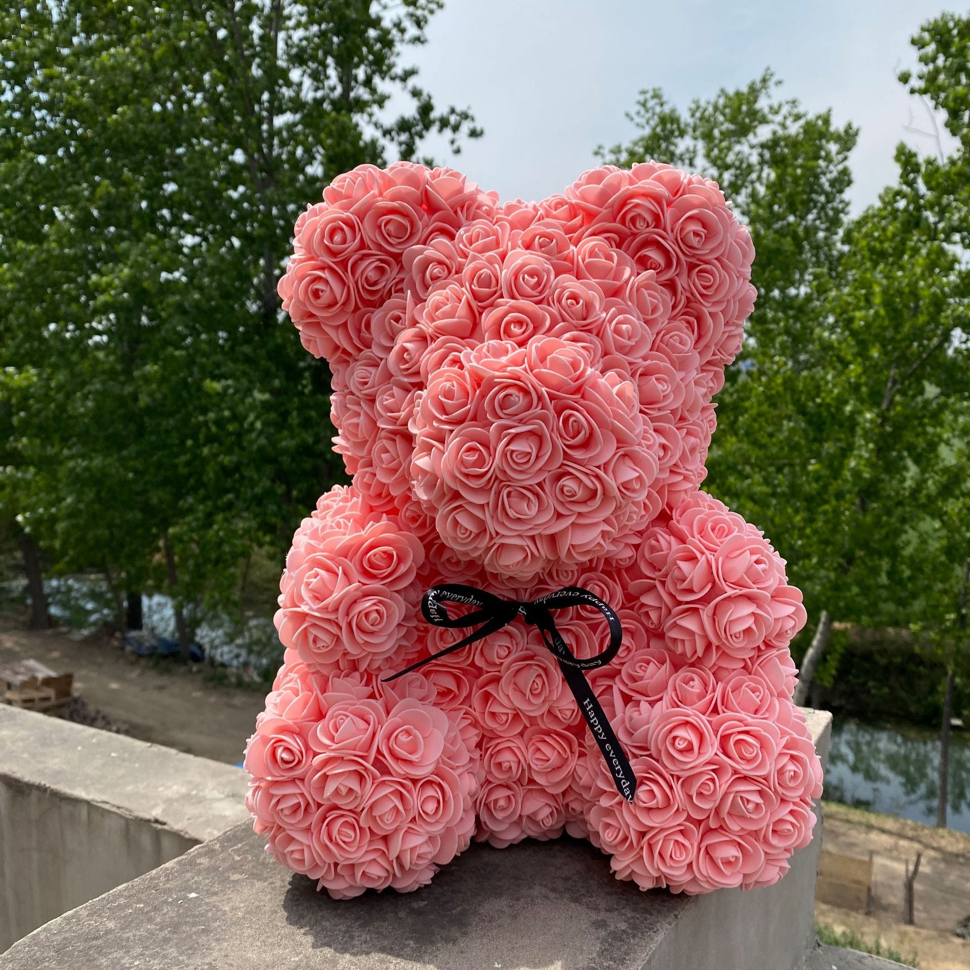 pink roses with teddy bear